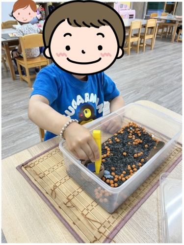 Child enjoying sensory play at BKMCC Childcare in North Delta