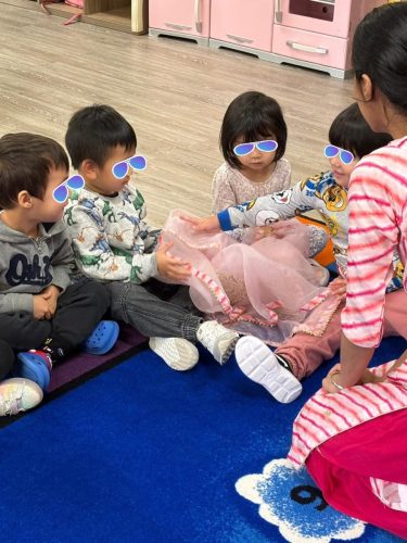 BKMCC Childcare children in North Delta explore Diwali fabrics and teamwork.