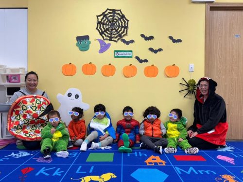 Toddlers and teachers dressed up for Halloween at BKMCC Childcare in North Delta.